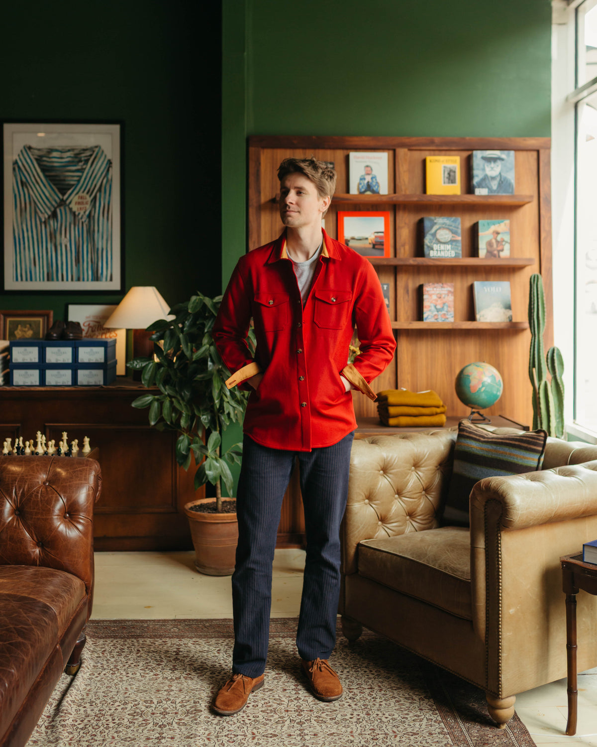 Man wearing Dehen 1920 Crissman Overshirt in Cardinal with hands in pockets at Fancy Groceries