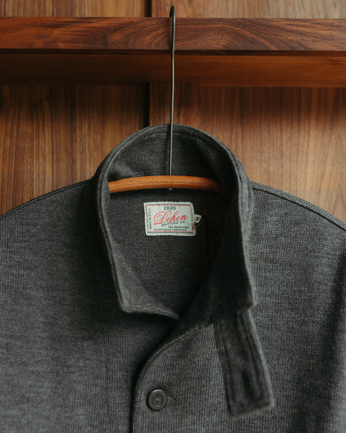 Dehen 1920 Submariner Jacket against wooden wall on hangar at Fancy Groceries