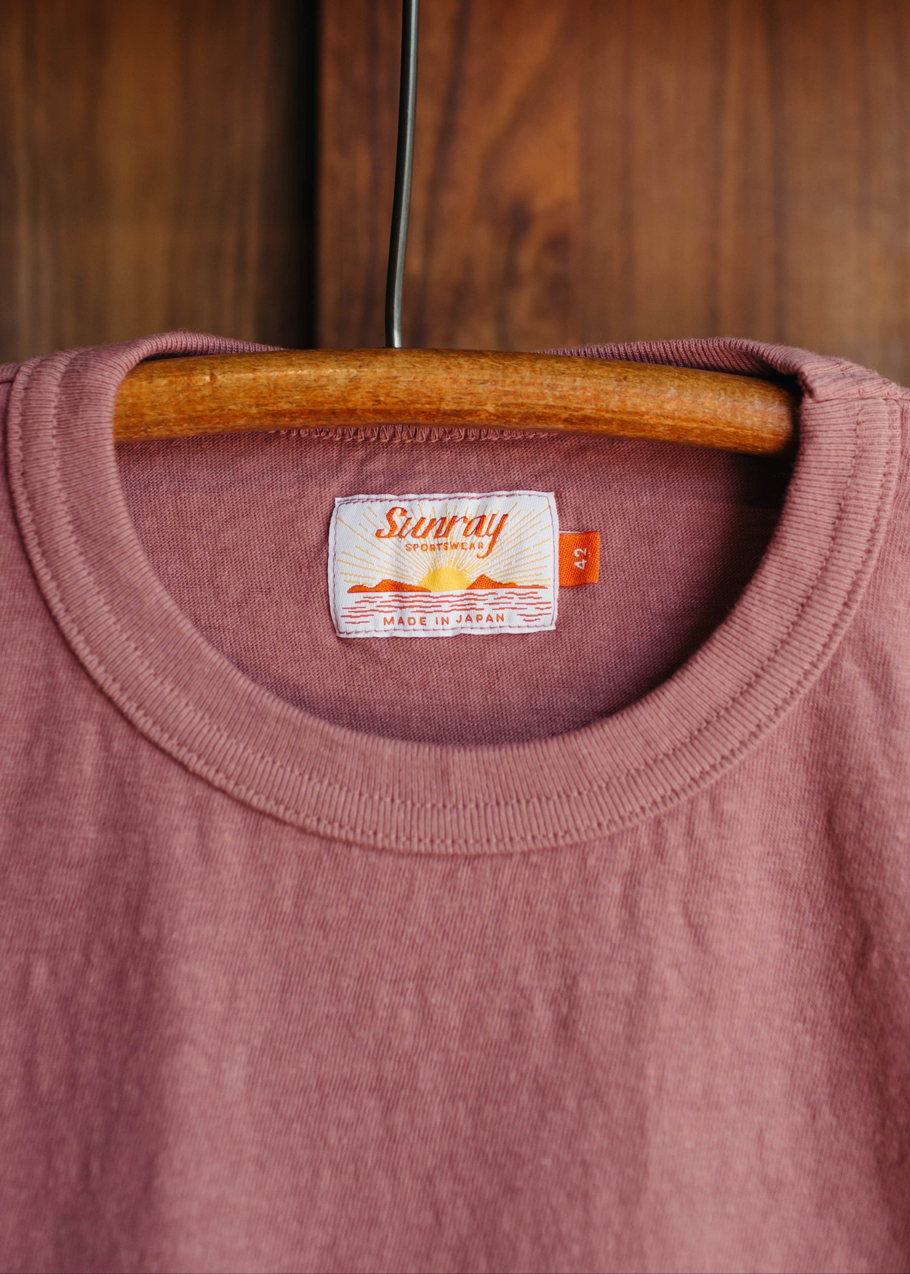 Mauve Pink Sunray Sportswear shirt with a Sunray label on a wooden hanger against a wooden background at Fancy Groceries